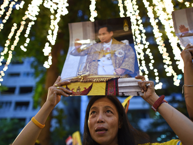 Thai man arrested for liking ‘doctored photo of the King and sharing it with 608 friends’ on Facebook Thai man arrested for liking ‘doctored photo of the King and sharing it with 608 friends’ on Facebook