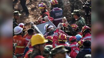 China landslide: More than 60 hours later, rescuers pull out one survivor
