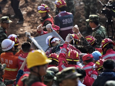 China landslide: More than 60 hours later, rescuers pull out one survivor China landslide: More than 60 hours later, rescuers pull out one survivor