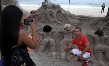 Feeling hot hot hot: Risqué sand sculptures of women on Copacabana beach irk local Brazilians