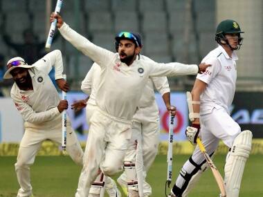 Indian cricket captain Virat Kohli with teammates celebrates winning of fouth Test match against South African on the final day, in New Delhi on Monday. PTI