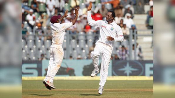 West Indies' Marlon Samuels banned from bowling by ICC for 12 months