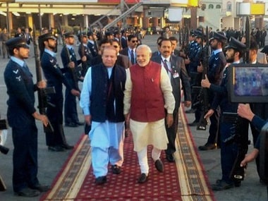 Prime Minister Narendra Modi is received by his Pakistani counterpart Nawaz Sharif upon his arrival in Lahore. PTI / Twitter @MEAIndia