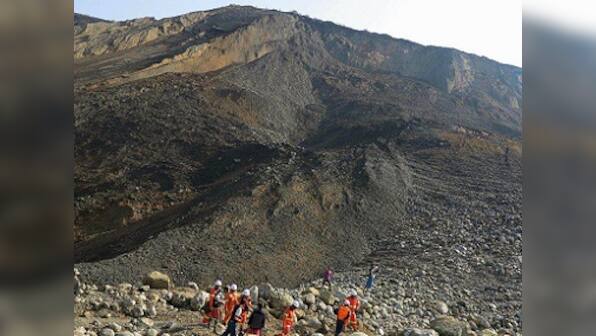 Dozens of workers buried alive as landslide collapses Myanmar jade mine