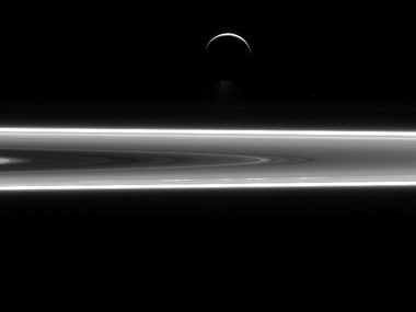 Saturn's silver sheen: Nasa unveils photo of the planet's crescent moon Saturn's silver sheen: Nasa unveils photo of the planet's crescent moon