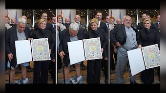 A novel photo-op: Croatia rights chief's trousers drop while posing for picture with president