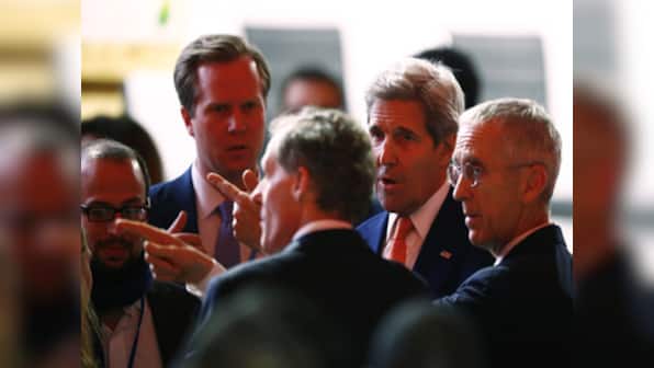 Hugs and tears of joy: Nearly 200 countries adopt historic Paris climate change pact