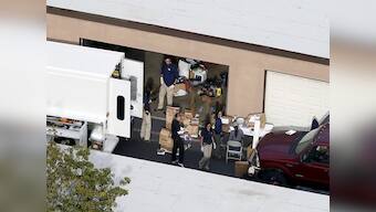 Baby toys, family photos, a Koran: California shooters' home thrown open to media