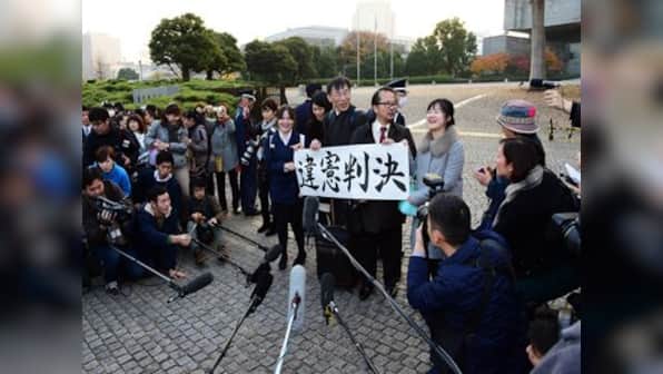 Japan top court upholds law on common surnames for married couples