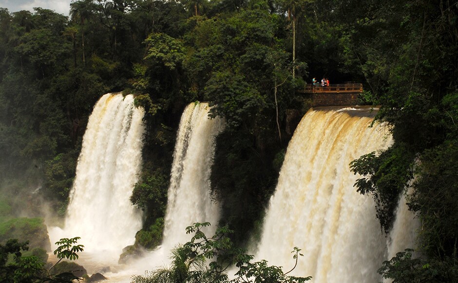 Iguazú Falls, Argentina/Brazil: The tropical-green cascades of the 20 major Iguazu waterfalls, together with their tributaries, looks like something out of an age long before our time. It is easy to imagine flying dinosaurs soaring above the falls. A listed UNESCO World Heritage Site, the Iguazú Falls can be viewed from both the Brazilian and Argentinian sides. A footpath leads to the circular-shaped Garganta del Diablo - the Devil's Throat - where the hiker comes very close to feeling the sheer power of the mass of water. Travellers will usually stay overnight at Foz do Iguaco on the Brazilian side or Puerto Iguazú in Argentina. DPA. Iguazú Falls, Argentina/Brazil: The tropical-green cascades of the 20 major Iguazu waterfalls, together with their tributaries, looks like something out of an age long before our time. It is easy to imagine flying dinosaurs soaring above the falls. A listed UNESCO World Heritage Site, the Iguazú Falls can be viewed from both the Brazilian and Argentinian sides. A footpath leads to the circular-shaped Garganta del Diablo - the Devil's Throat - where the hiker comes very close to feeling the sheer power of the mass of water. Travellers will usually stay overnight at Foz do Iguaco on the Brazilian side or Puerto Iguazú in Argentina. DPA.