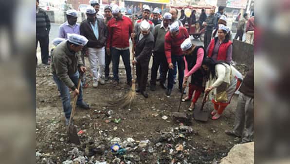 Dirt wars in Delhi? AAP leaders clean garbage piled up by protesting civic workers