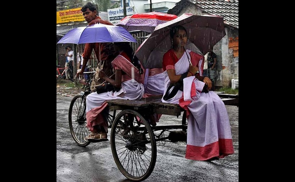 Kushal Gangopadhyay took this photograph a few years ago at Kakdwip in South 24 Parganas district in West Bengal. The 55-year-old service professional was impressed on seeing the girls taking so much interest in their education, that even the inconvenience of a commute in the relentless monsoon did not deter them from going to school. Kushal Gangopadhyay took this photograph a few years ago at Kakdwip in South 24 Parganas district in West Bengal. The 55-year-old service professional was impressed on seeing the girls taking so much interest in their education, that even the inconvenience of a commute in the relentless monsoon did not deter them from going to school.
