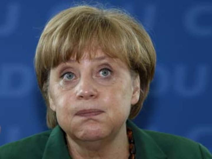 She is on the right side of history: Merkel basks in Obama's refugee policy praise