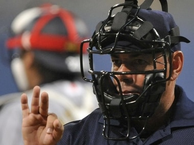 Cricket must take cue from baseball where umpires wear protective gear. AFP