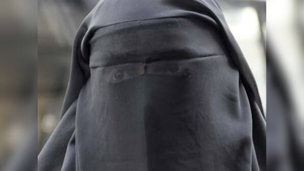 UK PM David Cameron backs ban on burqas in schools but refuses to go the French way