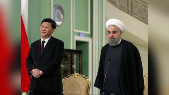 'New chapter in Tehran-Beijing relations': Iran's President Rouhani hails Chinese President Xi Jinping's visit