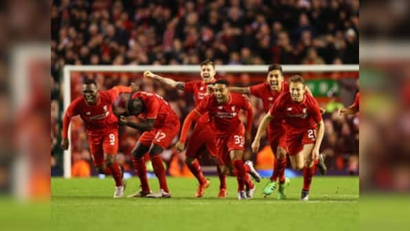 Liverpool show grit in shootout against Stoke City to reach Capital One Cup final