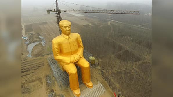 Gigantic and golden, statue of Mao Zedong draws mixed reactions in China