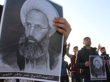 Protestors shout death to the Al Saud family/ Reuters