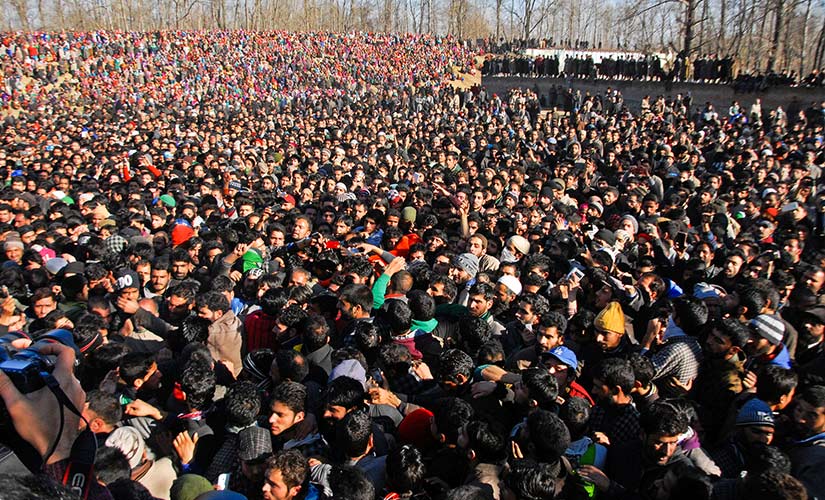 People gathered at the funeral of Bhat. Firstpost/Sameer Yasir
