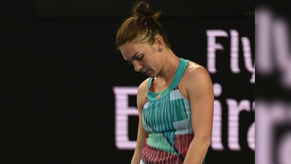 Australian Open: No. 2 Simona Halep, No. 5 Rafael Nadal headline a day of upsets in Melbourne