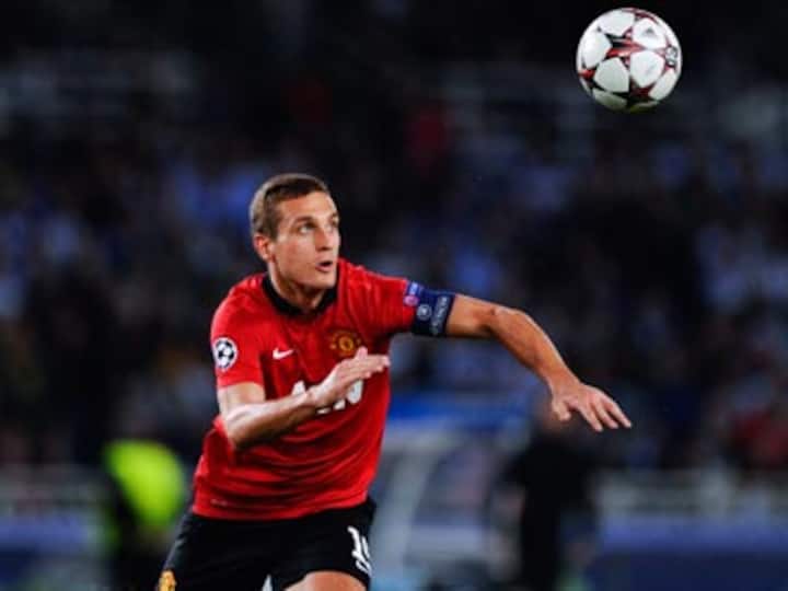 Former Manchester United captain Nemanja Vidic hangs up his boots