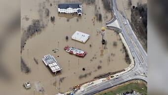 Soldiers hit streets as US floods death toll mounts to 22