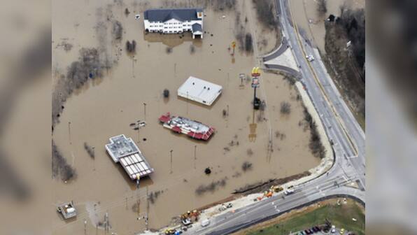 Soldiers hit streets as US floods death toll mounts to 22