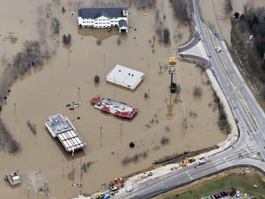 Soldiers hit streets as US floods death toll mounts to 22 Soldiers hit streets as US floods death toll mounts to 22