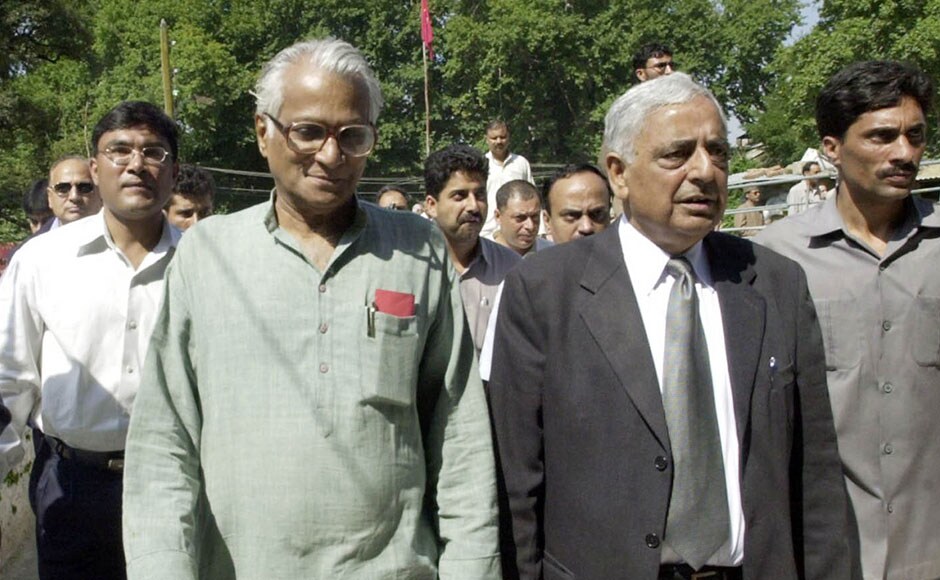 George Fernandes and Mufti Mohammad Sayeed walk with security personnel during a function at Mattan, some 60 kms south of Srinagar, on 14 September, 2003. Fernandes' visit comes as two Indian security force troops and a civilian were killed and four other people injured in two separate incidents in the Himalayan state. AFP George Fernandes and Mufti Mohammad Sayeed walk with security personnel during a function at Mattan, some 60 kms south of Srinagar, on 14 September, 2003. Fernandes' visit comes as two Indian security force troops and a civilian were killed and four other people injured in two separate incidents in the Himalayan state. AFP