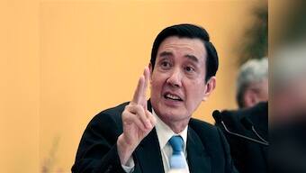 Taiwan president visits island in disputed South China Sea despite criticism from ally US