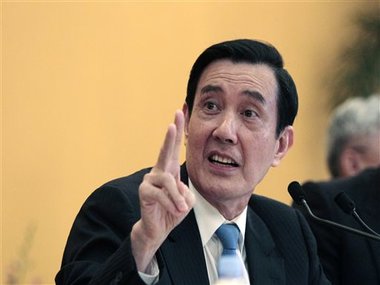 Taiwan president visits island in disputed South China Sea despite criticism from ally US Taiwan president visits island in disputed South China Sea despite criticism from ally US