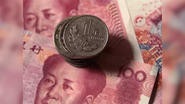 China FX reserves fall almost $100 bln to lowest since May 2012