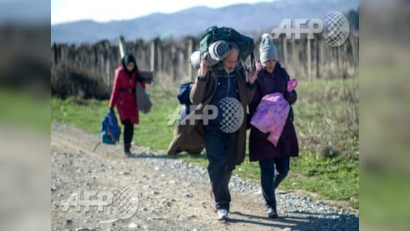 Walking the walk: Greek migrants prefer to walk to Macedonia border with family in tow