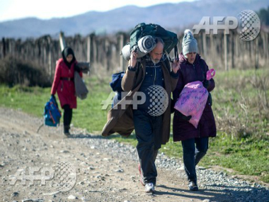 Walking the walk: Greek migrants prefer to walk to Macedonia border with family in tow Walking the walk: Greek migrants prefer to walk to Macedonia border with family in tow