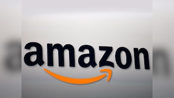 Amazon shares break $1,000, beating Google's Alphabet; analysts see more gains