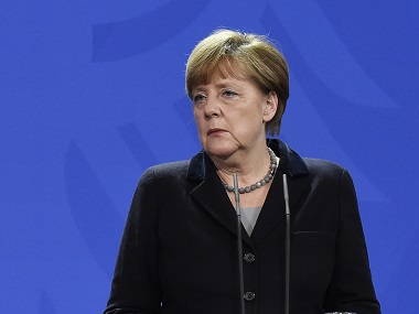 Ukraine crisis: Use influence and rein in separatists, Angela Merkel tells Vladimir Putin Ukraine crisis: Use influence and rein in separatists, Angela Merkel tells Vladimir Putin