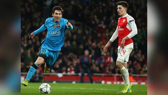 Champions League: Messi breaks Cech jinx as Barcelona beat feisty Arsenal 2-0