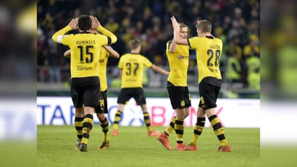 Borussia Dortmund, Werder Bremen reach German Cup semis with 3-1 wins