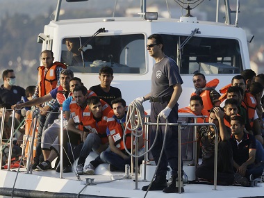 Refugee crisis: Migrants arrive in Greek island ports for expulsion to Turkey Refugee crisis: Migrants arrive in Greek island ports for expulsion to Turkey