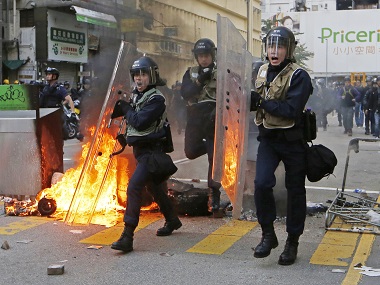 New Year celebrations turn violent: Hong Kong activists, police clash over holiday food stalls New Year celebrations turn violent: Hong Kong activists, police clash over holiday food stalls