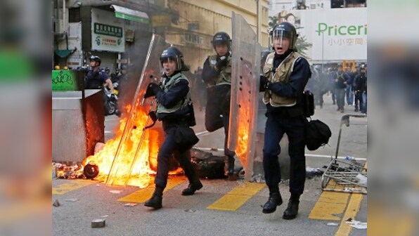 New Year celebrations turn violent: Hong Kong activists, police clash over holiday food stalls