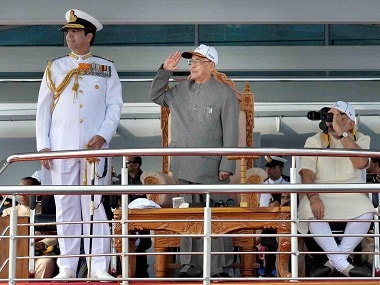 President Pranab Mukherjee, Prime Minister Narendra Modi, and Chief of Naval Staff Admiral RK Dhowan at the International Fleet Review and Flypast in Visakhapatnam on Saturday. PTI Photo(PTI2_6_2016_000046B) *** Local Caption ***