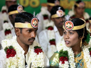 Brand Amma gets a boost: Couples at mass wedding wear headbands with Jayalalithaa's photo Brand Amma gets a boost: Couples at mass wedding wear headbands with Jayalalithaa's photo