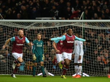 West Ham United's Italian defender Angelo Ogbonna celebrates after scoring the late winning goal in the English FA Cup fourth round replay against Liverpool. AFP