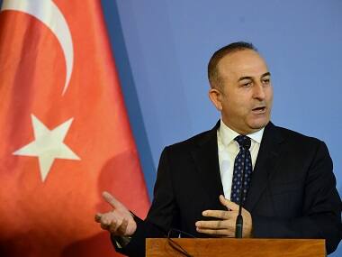 Turkey's foreign minister wants no conditions for Cyprus peace summit