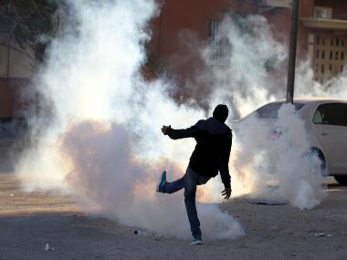A protester in an anti-government clash in Sitra, 2011. REUTERS