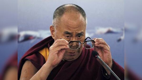 Hanging Dalai Lama's portrait in China is like hanging Saddam Hussain's photo in America: Shopkeepers in Beijing told