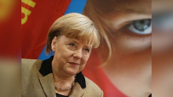 German parliament toughens asylum rules in a bid to reduce influx of migrants