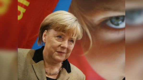 German parliament toughens asylum rules in a bid to reduce influx of migrants